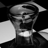 Excersizes with caustics on chess figures made out from glass and ice
